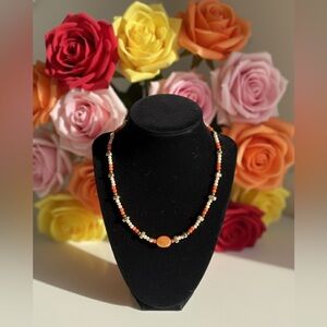 Elegant Beaded Necklace - Orange and Cream
